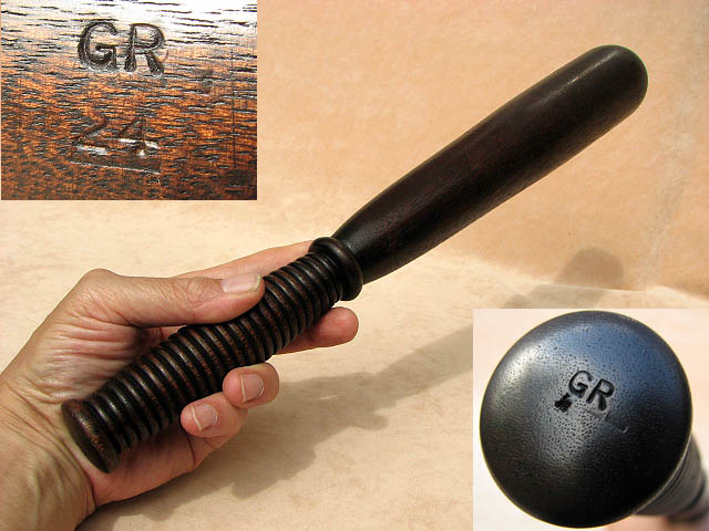 Long hardwood truncheon with grooved grip stamped 'GR'